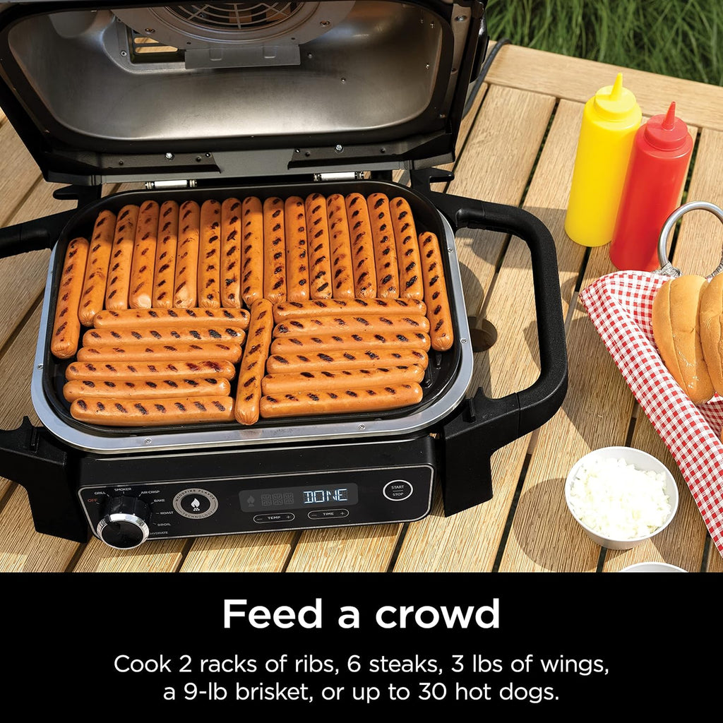 Ninja | Série Feu de Bois | 7 en 1 (BBQ Grill, BBQ, Rôtissage, Friture à Air, Déshydratation, Grillage, Fumage) | Portable et résistant aux intempéries | Cuisson jusqu'à 6 steaks et 30 hot-dogs | Granulés de bois inclus | OG701