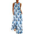 Robe longue maxi sans manches à col en V et poches, ornée de pingouins en veste bleue.